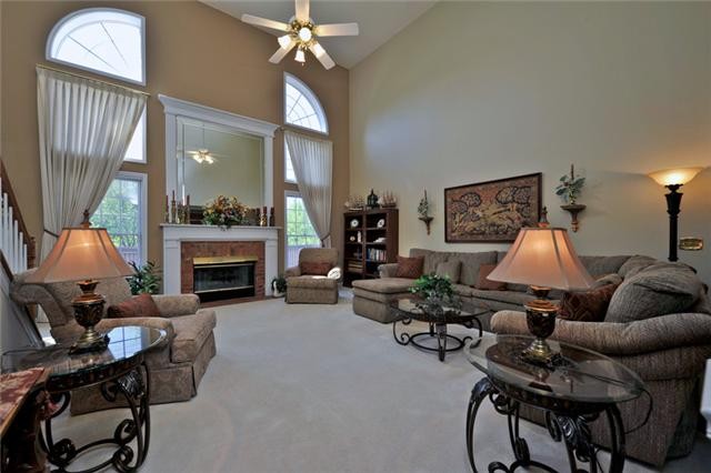 102 Chester Stevens Road Franklin, TN 37067 - Photo 6 of 19 a living room with furniture and a fireplace