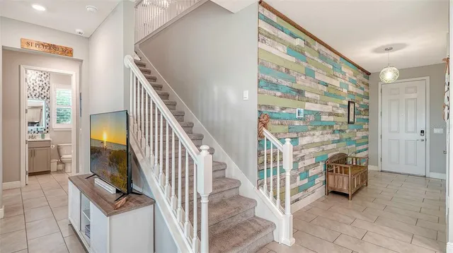 a view of an entryway with furniture