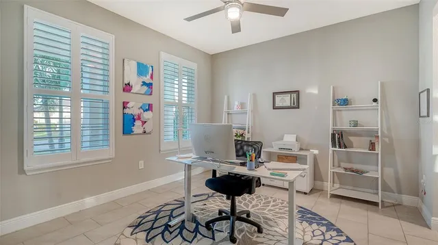 a workspace with furniture and a window