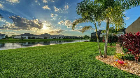 a view of a lake with a big yard