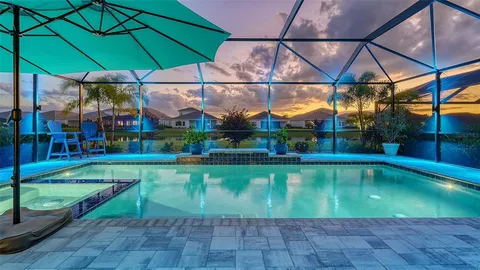 a view of a swimming pool with a porch