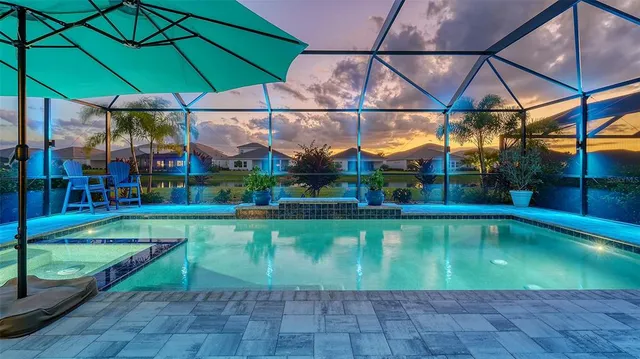 a view of a swimming pool with a porch