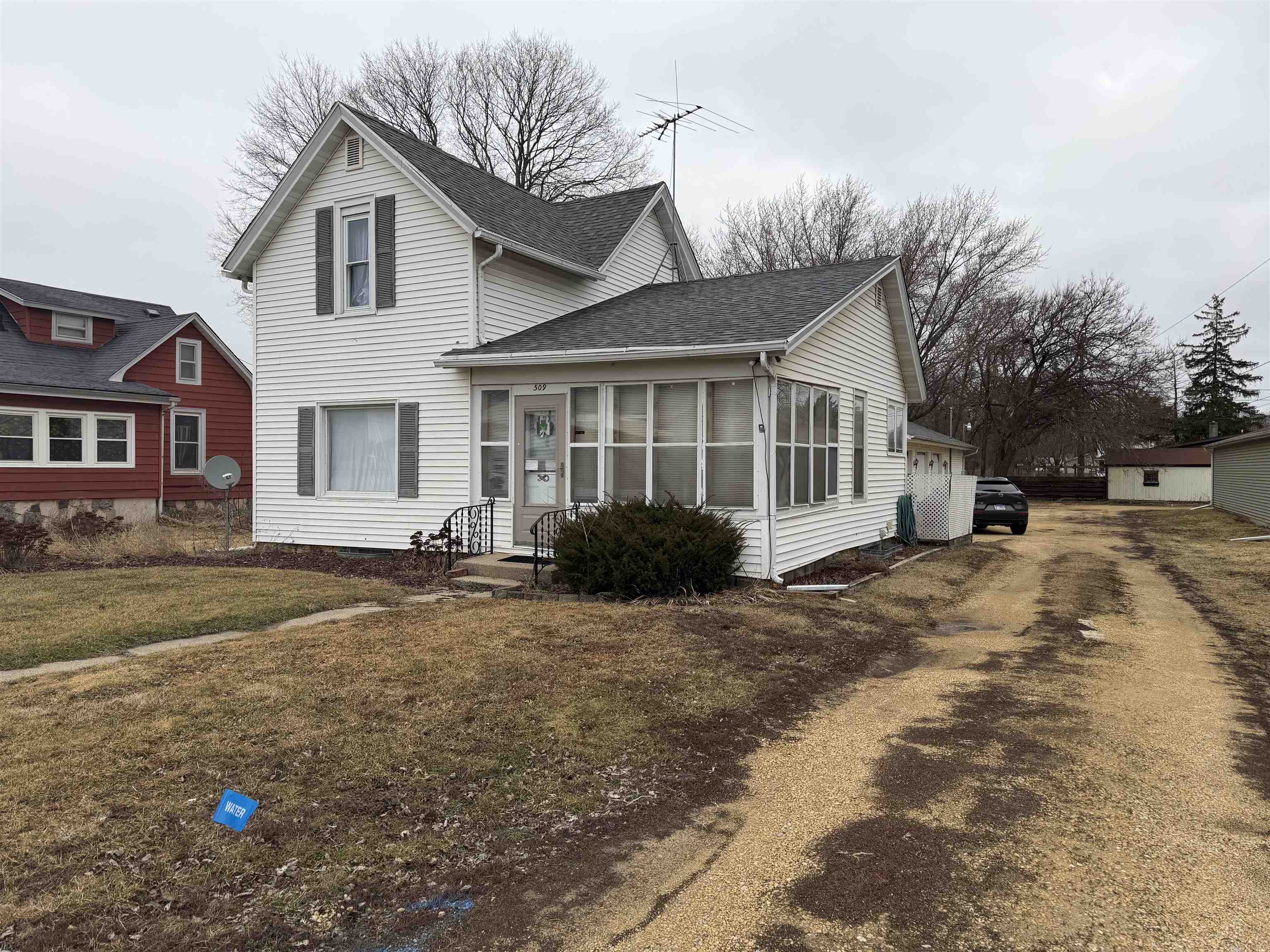 509 North Walnut Street Byron, IL 61010 - Photo 2 of 15 a view of a yard in front of a house