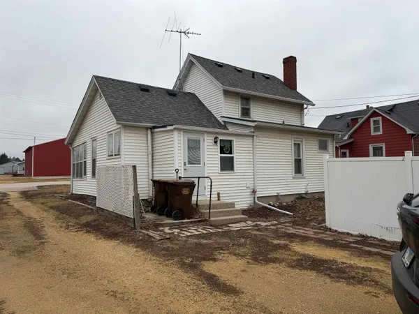 a front view of a house with a garage
