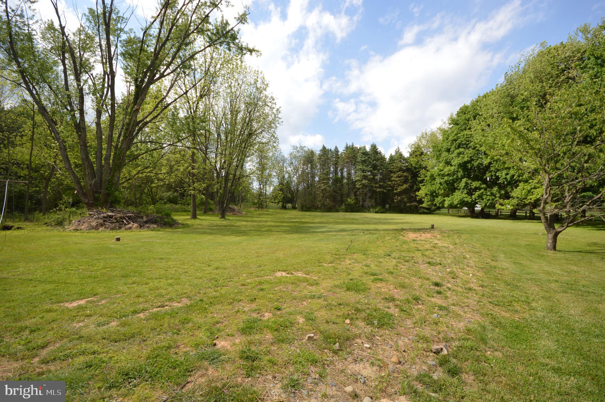 749 Street Road Cochranville, PA 19330 - Photo 10 of 35 Back lawn