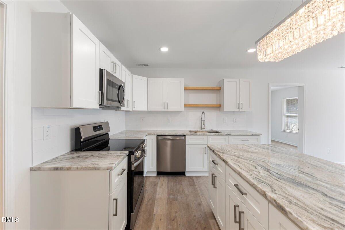 3305 Friar Tuck Road Raleigh, NC 27610 - Photo 7 of 18 12-3305 Friar Tuck Rd