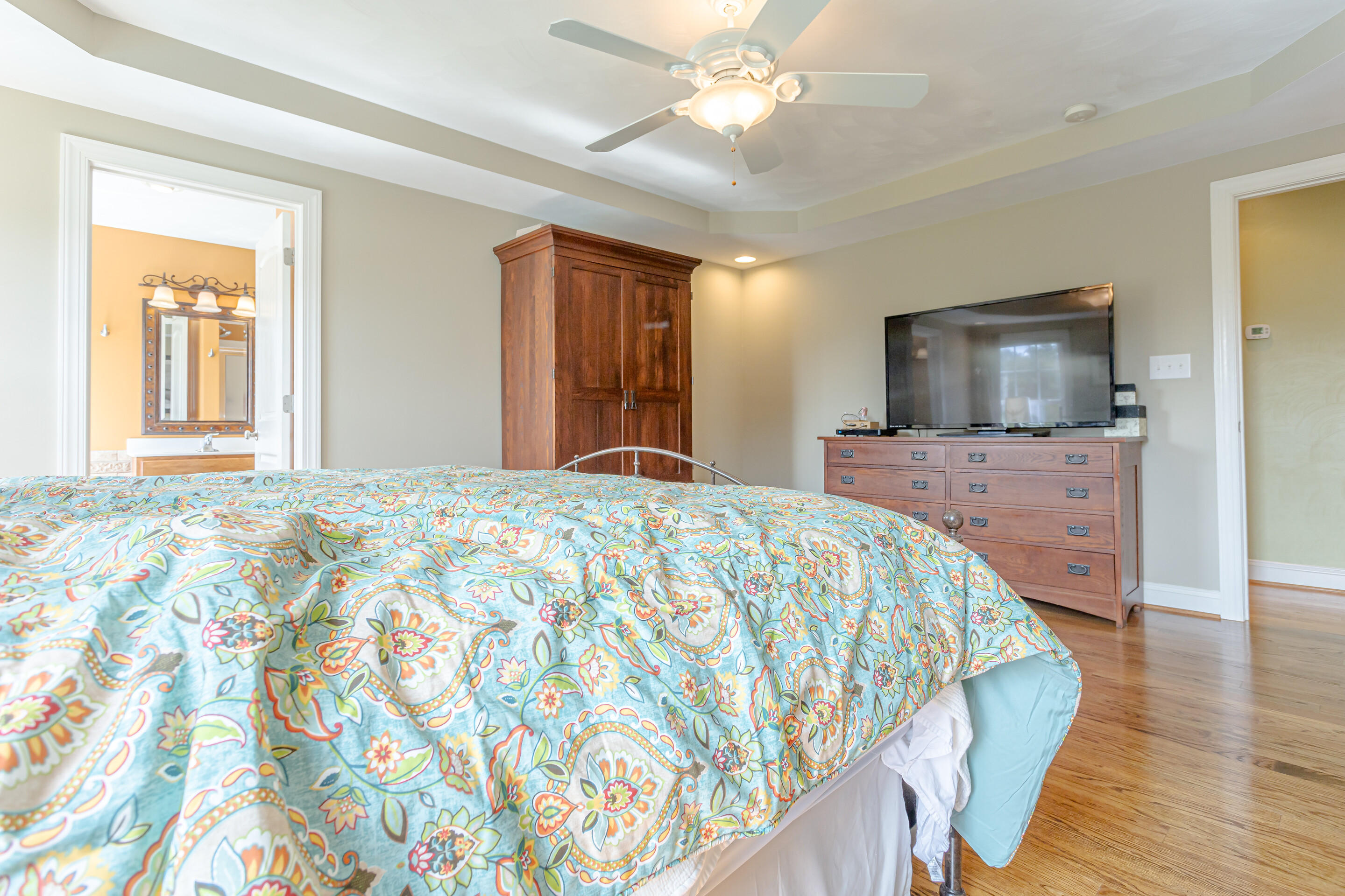 4510 Bethlehem Road Boones Mill, VA 24065 - Photo 15 of 48 a bedroom with a bed and a flat screen tv