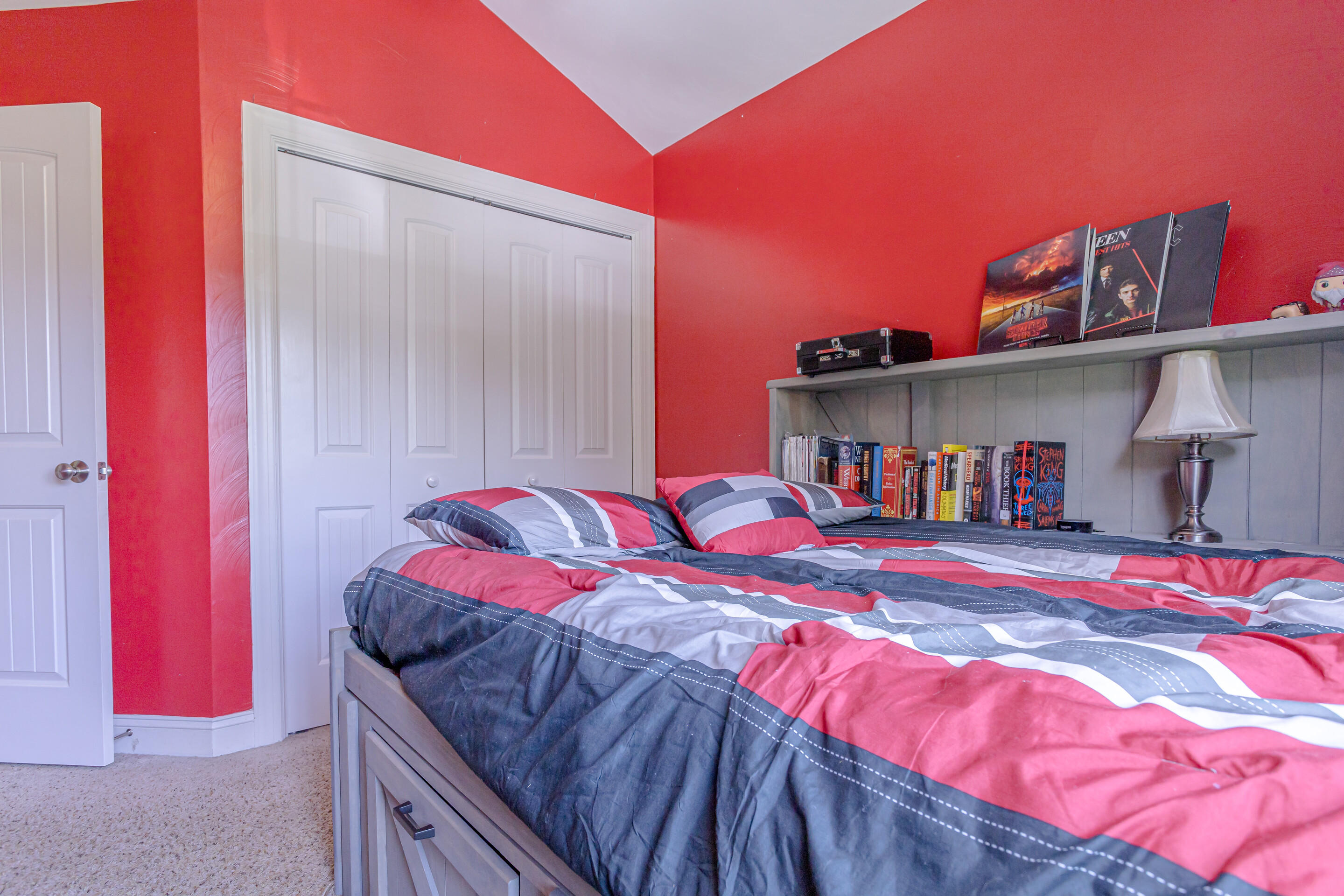 4510 Bethlehem Road Boones Mill, VA 24065 - Photo 20 of 48 a bed sitting in a bedroom next to a window