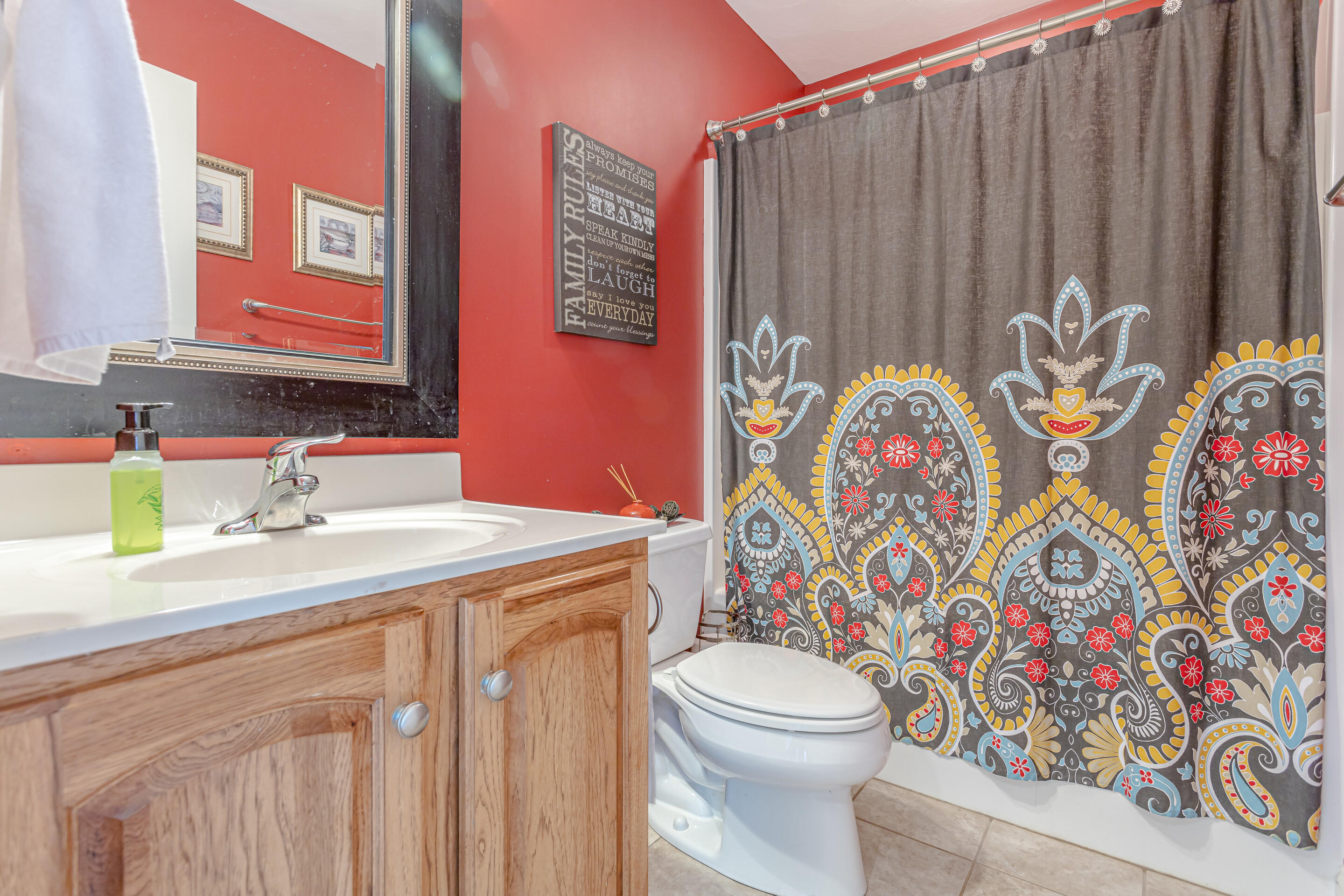 4510 Bethlehem Road Boones Mill, VA 24065 - Photo 21 of 48 a bathroom with a sink mirror vanity and toilet