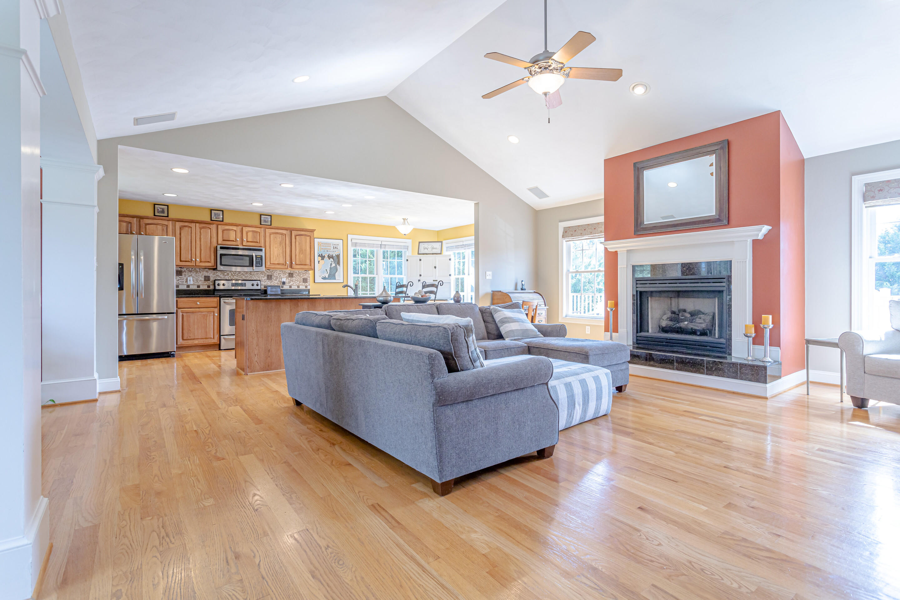 4510 Bethlehem Road Boones Mill, VA 24065 - Photo 4 of 48 a living room with furniture wooden floor and a fireplace