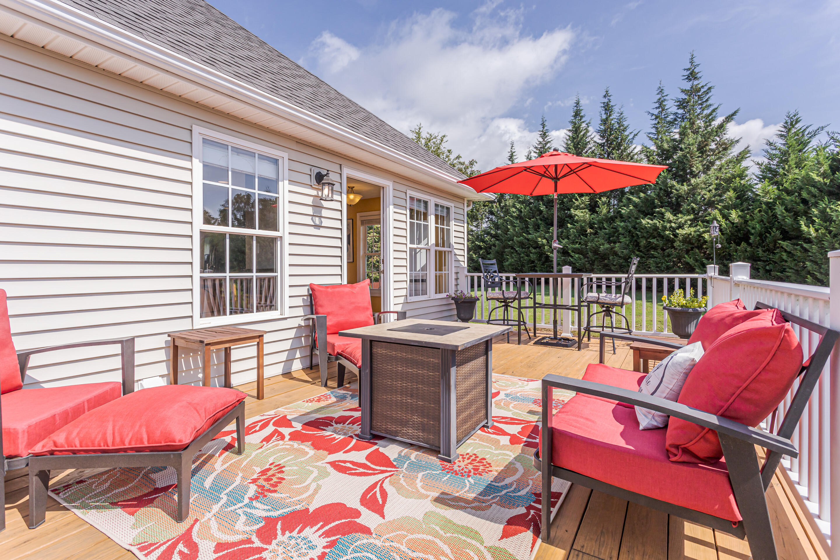 4510 Bethlehem Road Boones Mill, VA 24065 - Photo 33 of 48 a view of a patio with a table and chairs