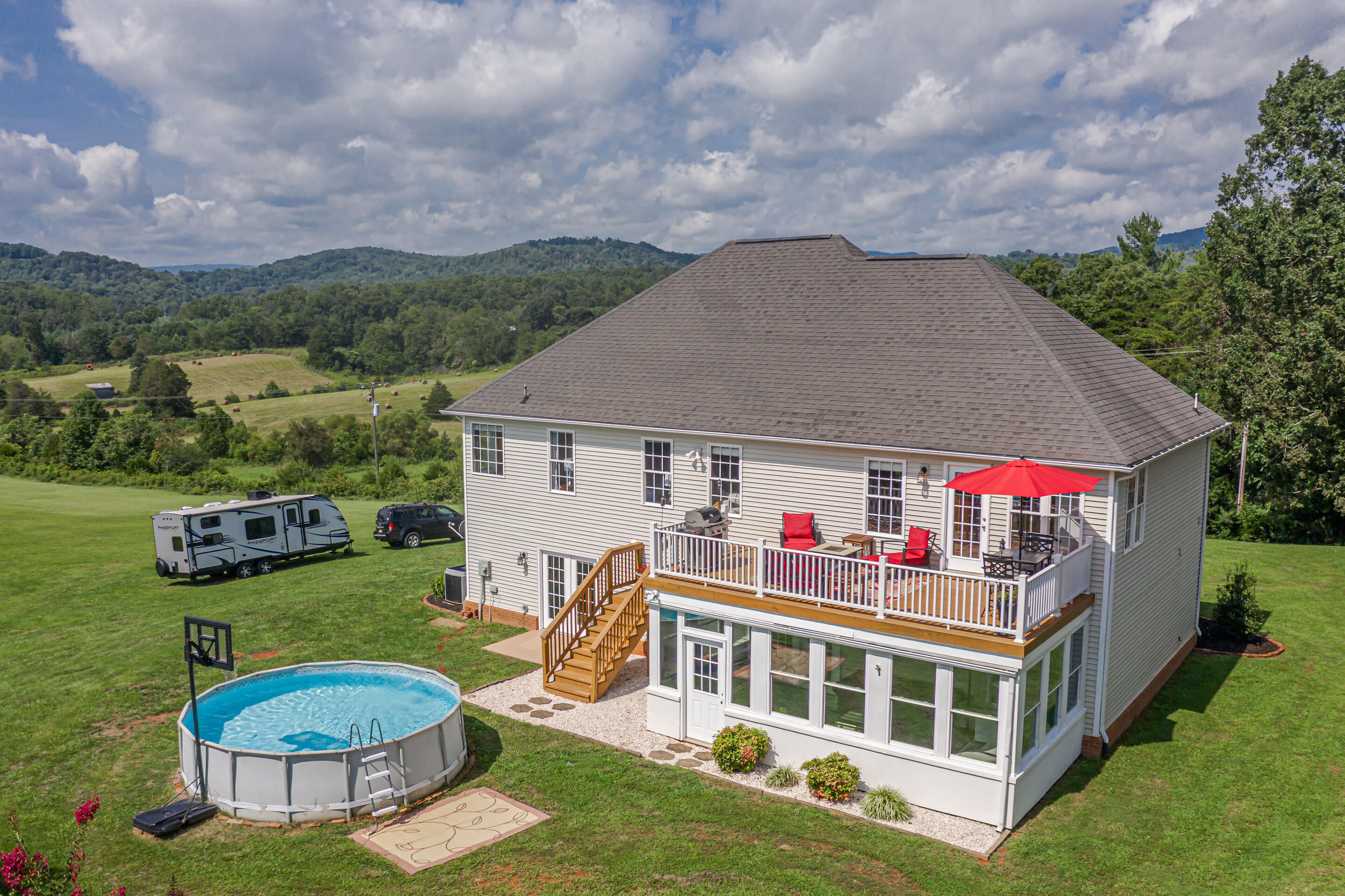 4510 Bethlehem Road Boones Mill, VA 24065 - Photo 35 of 48 a view of a house with pool and chairs