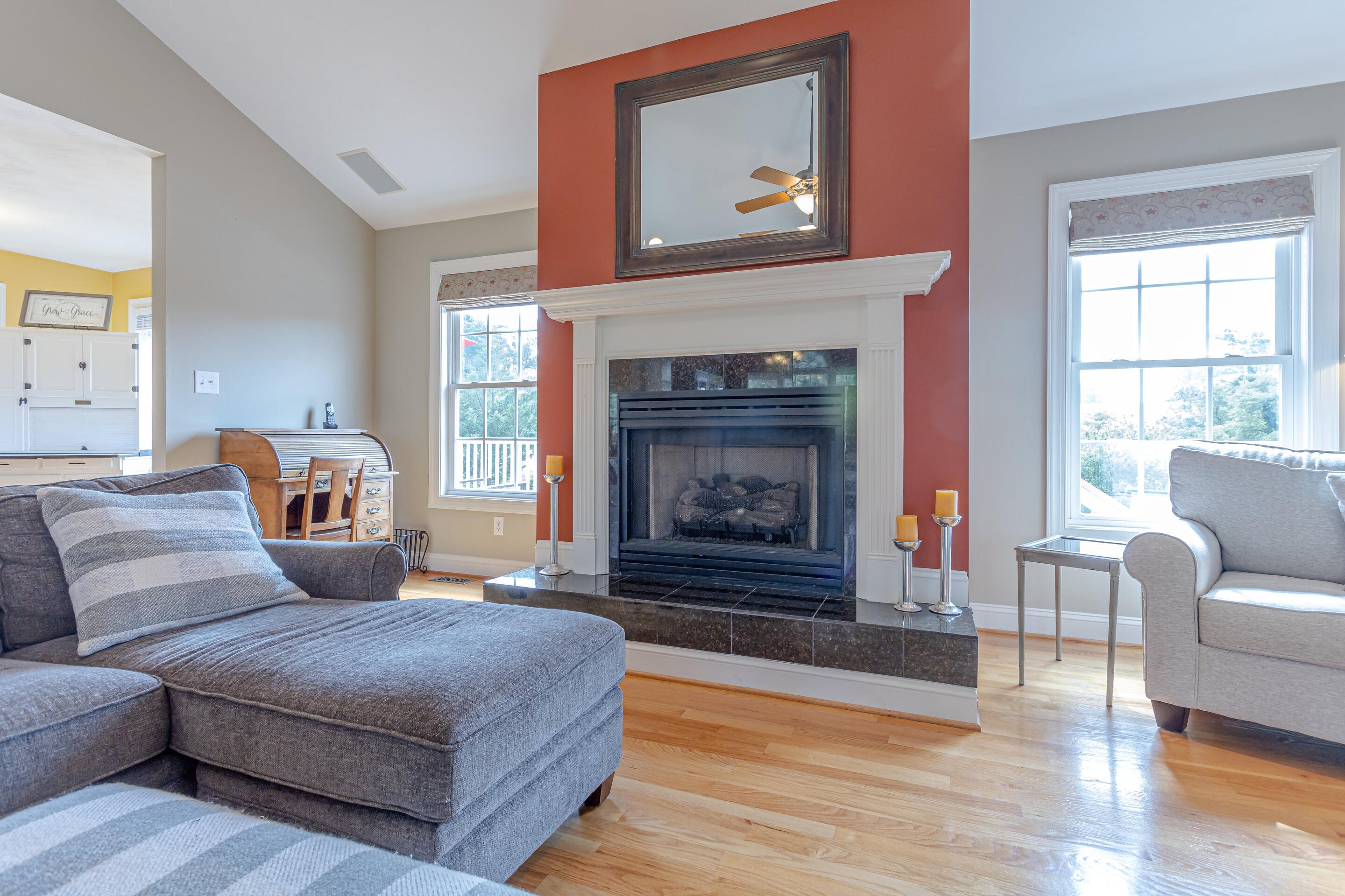 4510 Bethlehem Road Boones Mill, VA 24065 - Photo 5 of 48 a bedroom with a large bed and a fireplace