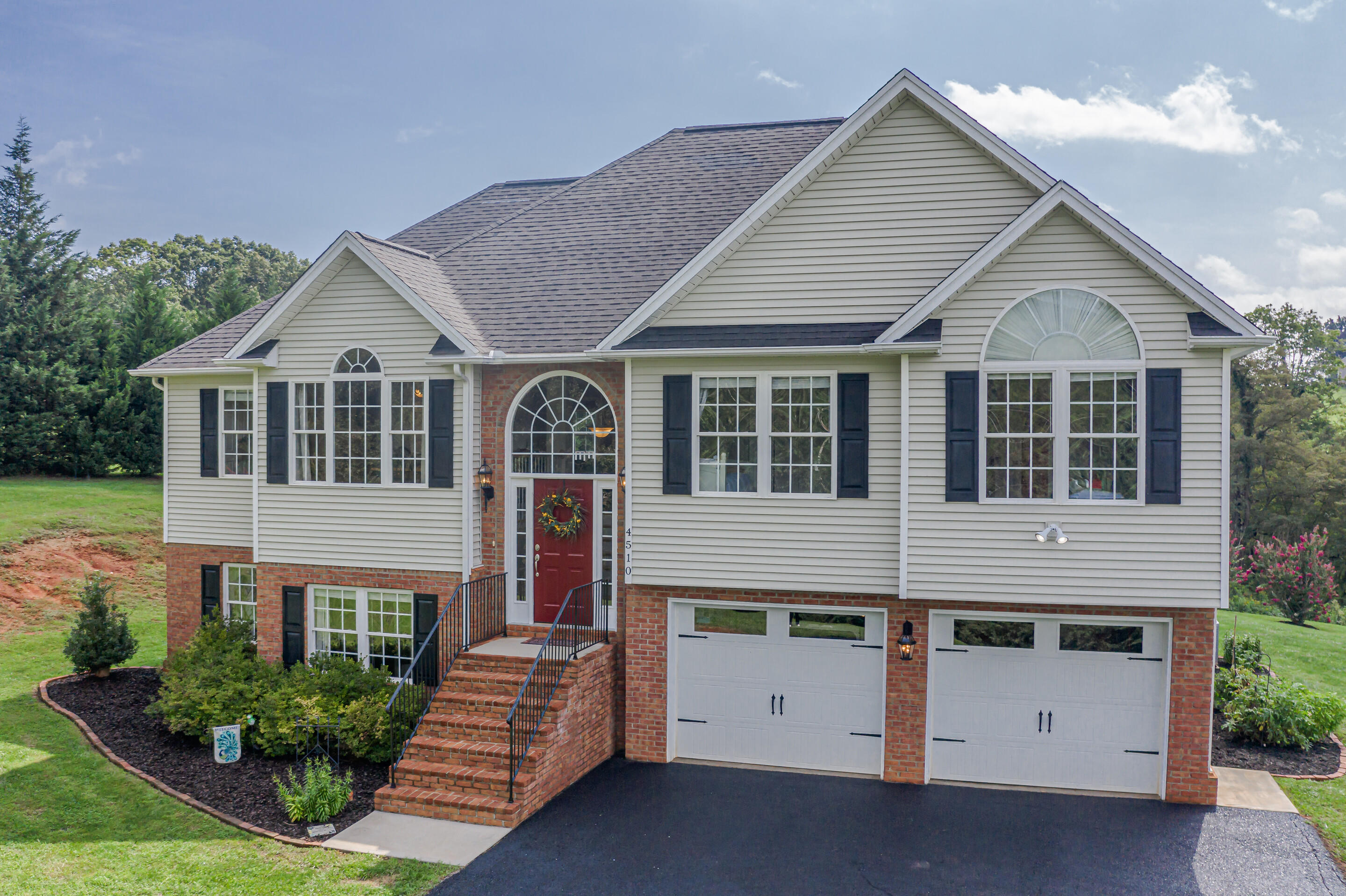 4510 Bethlehem Road Boones Mill, VA 24065 - Photo 47 of 48 a front view of a house with a yard
