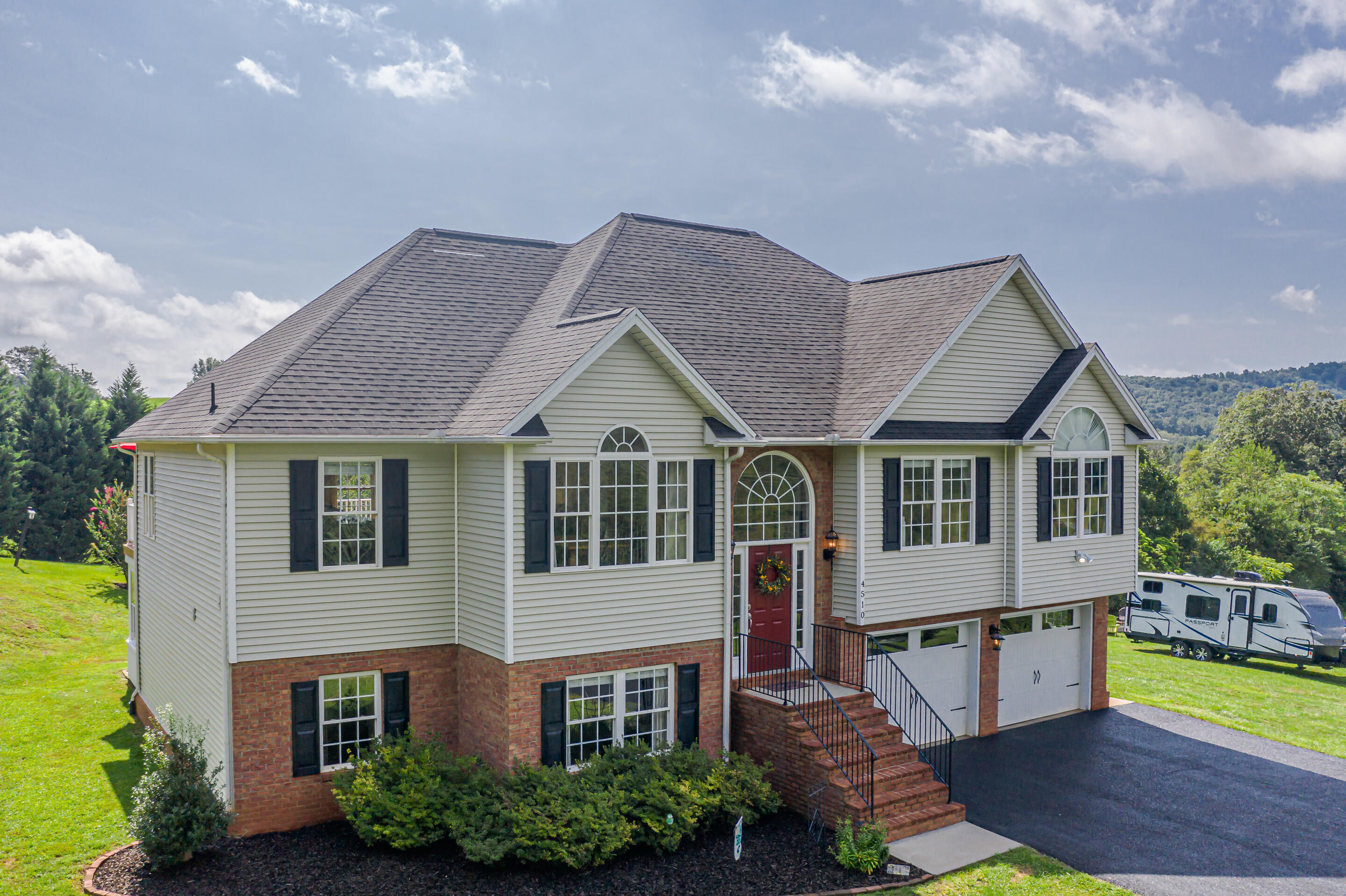 4510 Bethlehem Road Boones Mill, VA 24065 - Photo 48 of 48 a front view of a house with garden