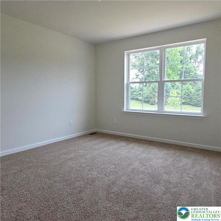 629 Fountain View Circle, Unit 8 Allentown, PA 18104 - Photo 13 of 16 an empty room with a window