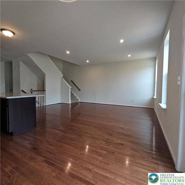 629 Fountain View Circle, Unit 8 Allentown, PA 18104 - Photo 5 of 16 a view of a room with wooden floors