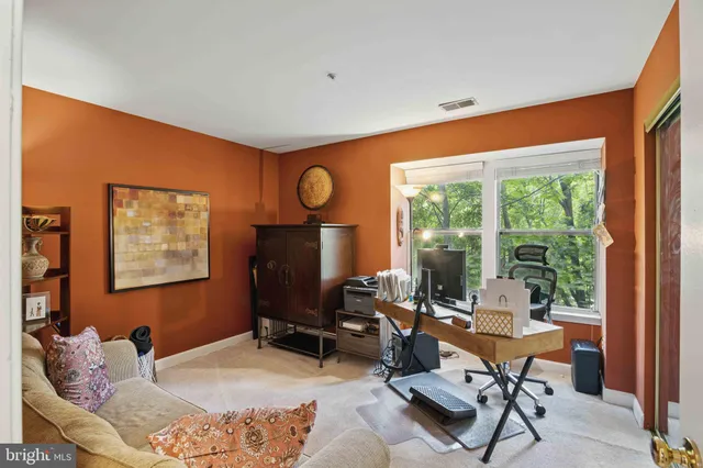 a room with furniture and a window