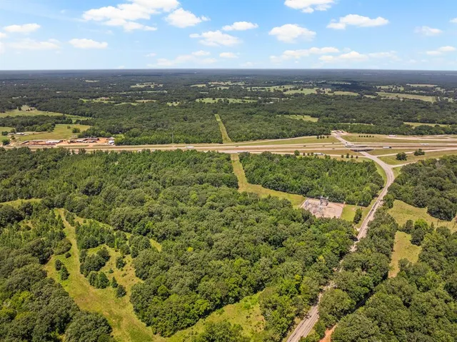 a view of a city with an ocean view
