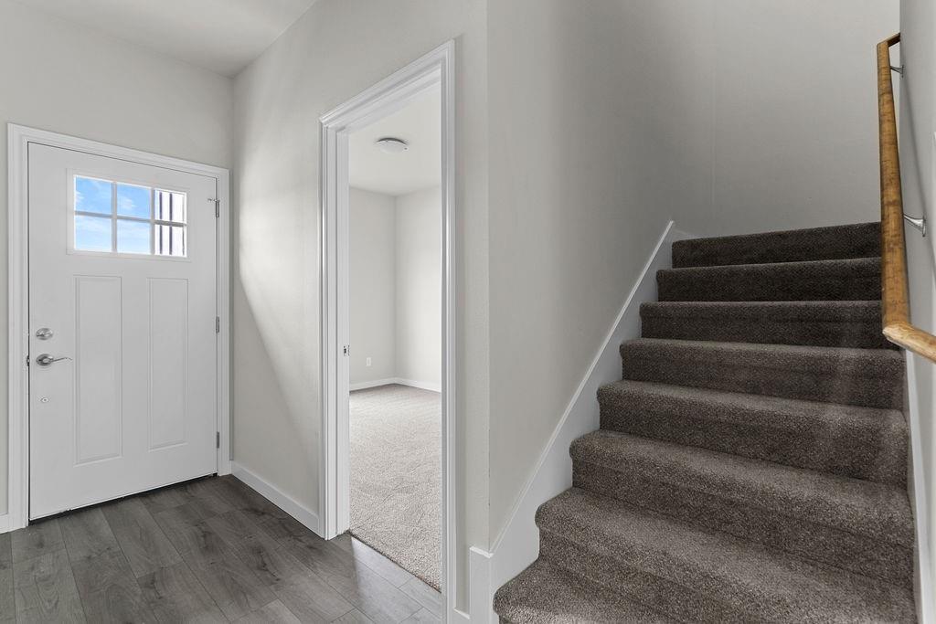 620 Alameda Road Azle, TX 76020 - Photo 10 of 27 a view of entryway with wooden floor