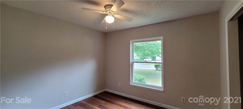 707 Finley Road Rock Hill, SC 29730 - Photo 16 of 26 an empty room with windows and fan