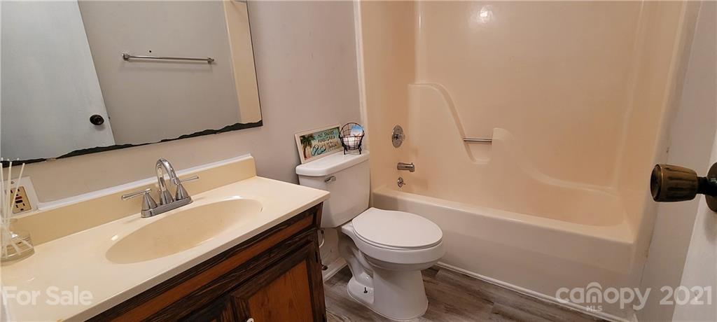 707 Finley Road Rock Hill, SC 29730 - Photo 19 of 26 a bathroom with a sink a toilet and shower