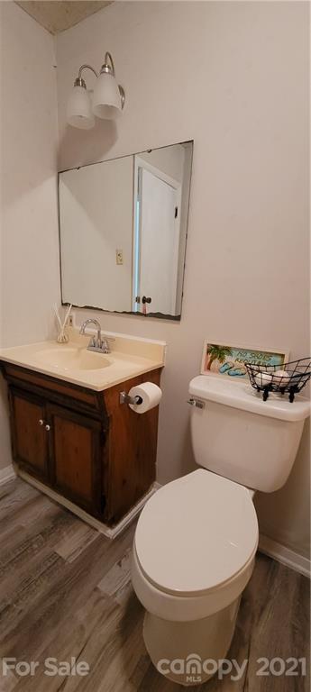 707 Finley Road Rock Hill, SC 29730 - Photo 20 of 26 a bathroom with a toilet sink and mirror