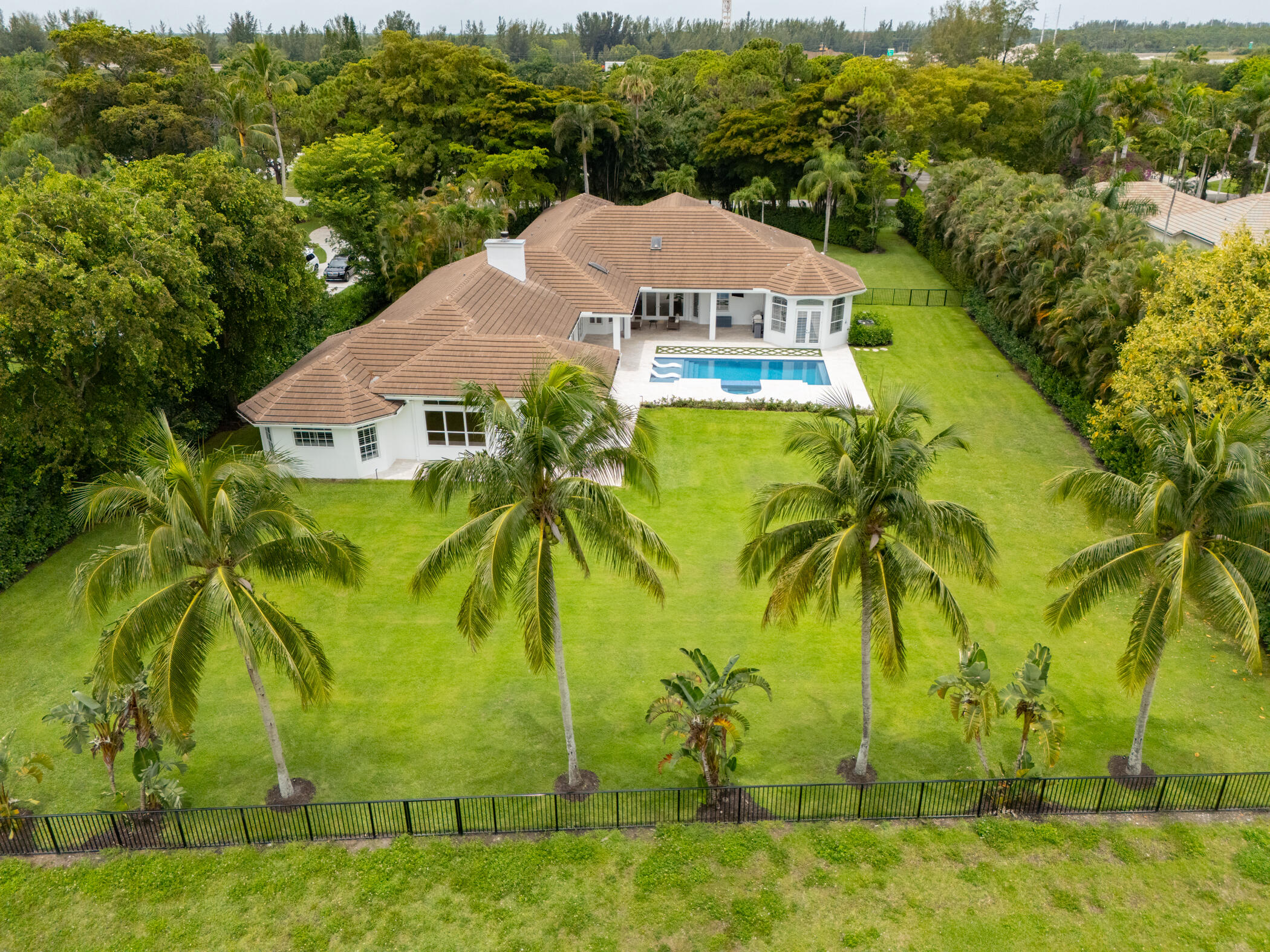 8246 Man O War Road Palm Beach Gardens, FL 33418 - Photo 6 of 55 Aerial of Backyard