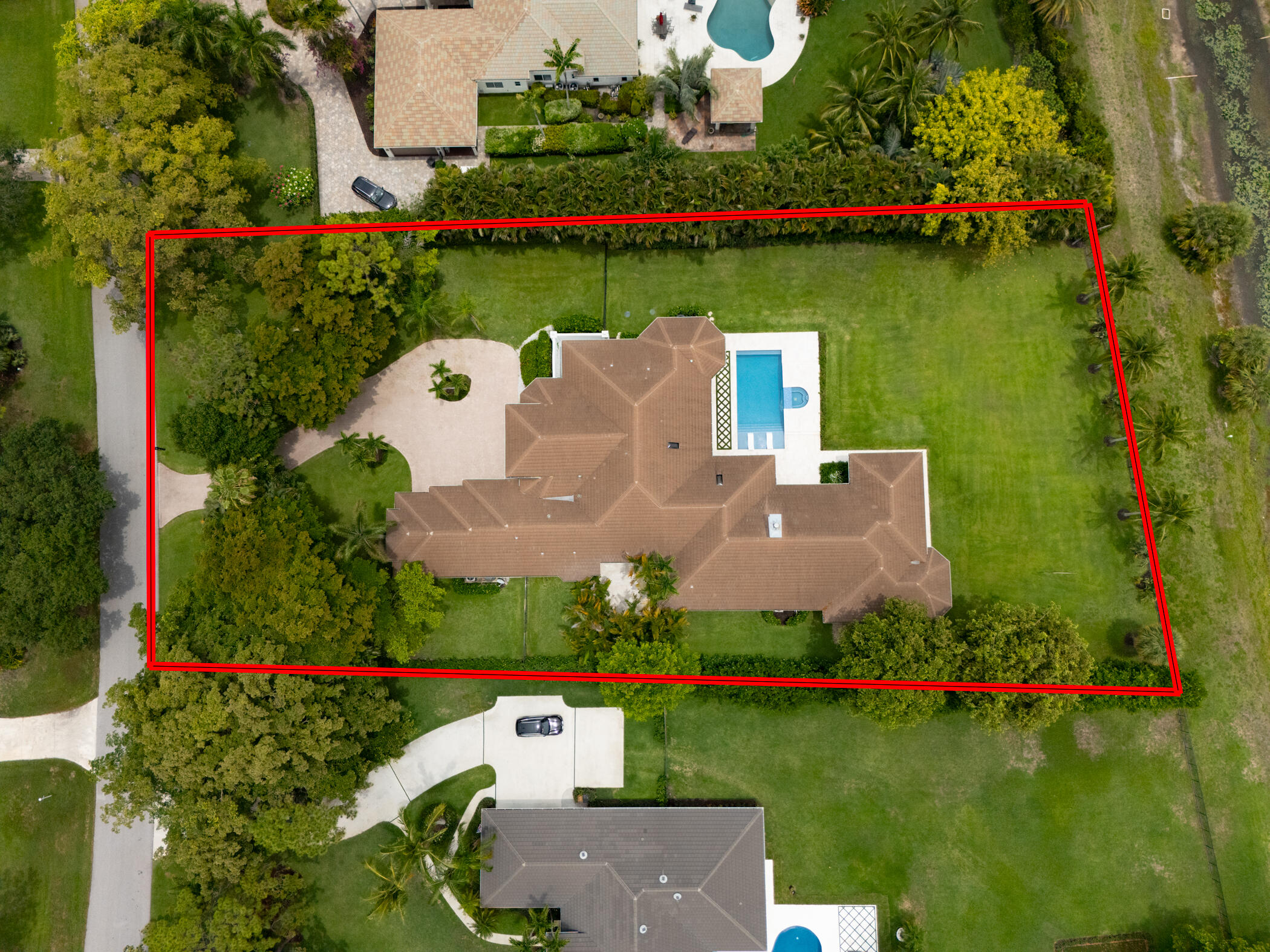 8246 Man O War Road Palm Beach Gardens, FL 33418 - Photo 7 of 55 Aerial with Lot Line