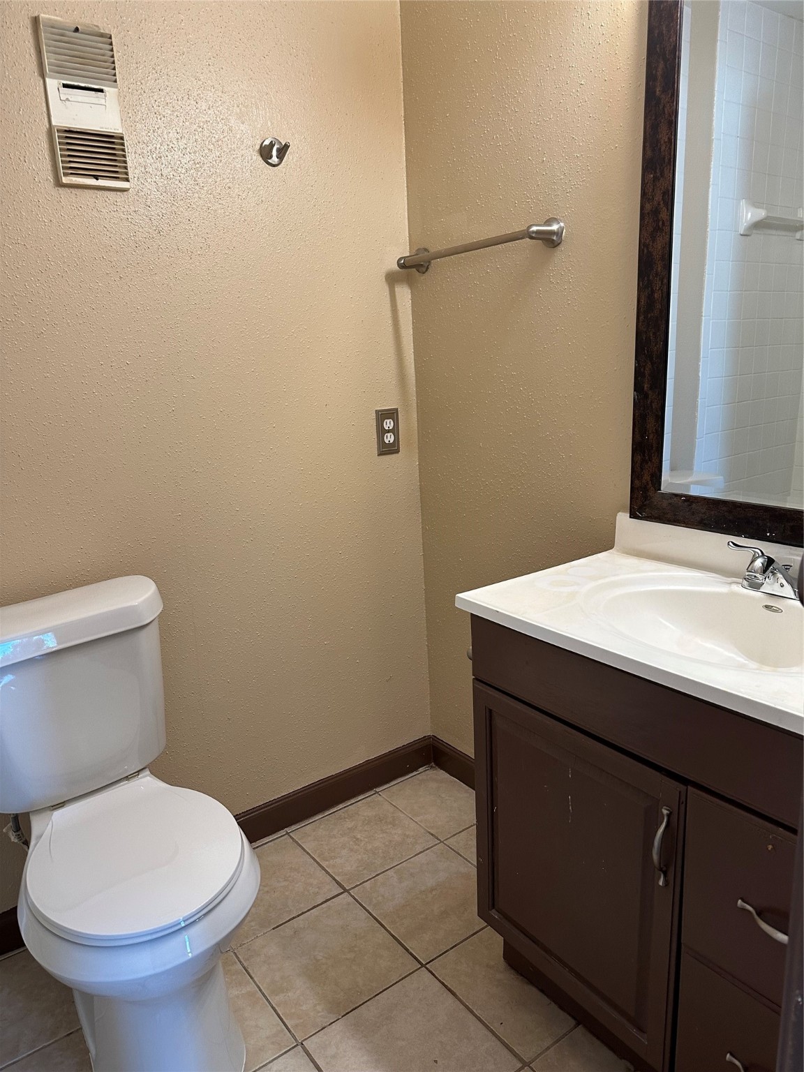 10100 South Gessner Road, Unit 414 Houston, TX 77071 - Photo 13 of 13 a bathroom with a sink and a toilet