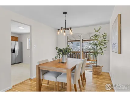a view of a living room and dining room