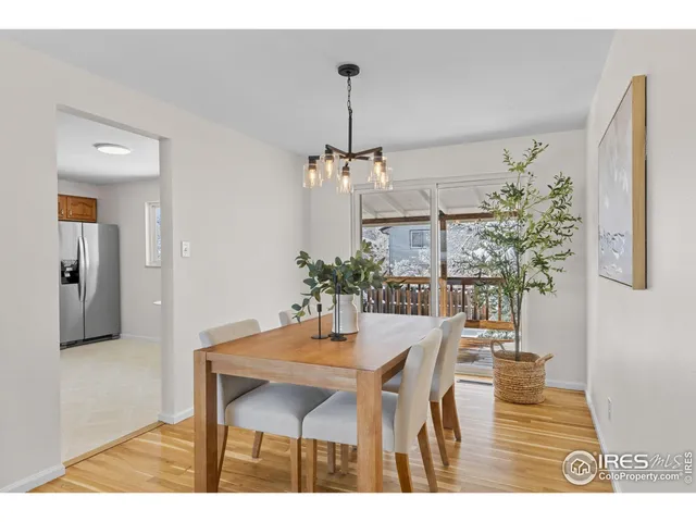 a view of a living room and dining room