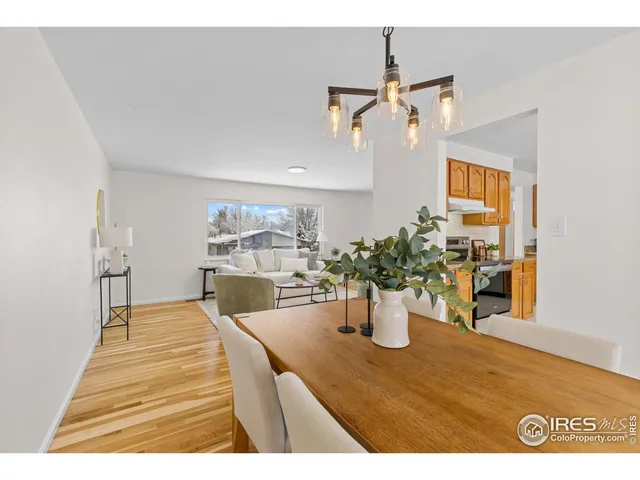 a kitchen with a sink stove and refrigerator