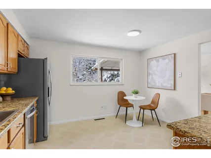 a workspace with furniture and a painting