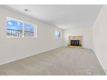 a living room with a fireplace