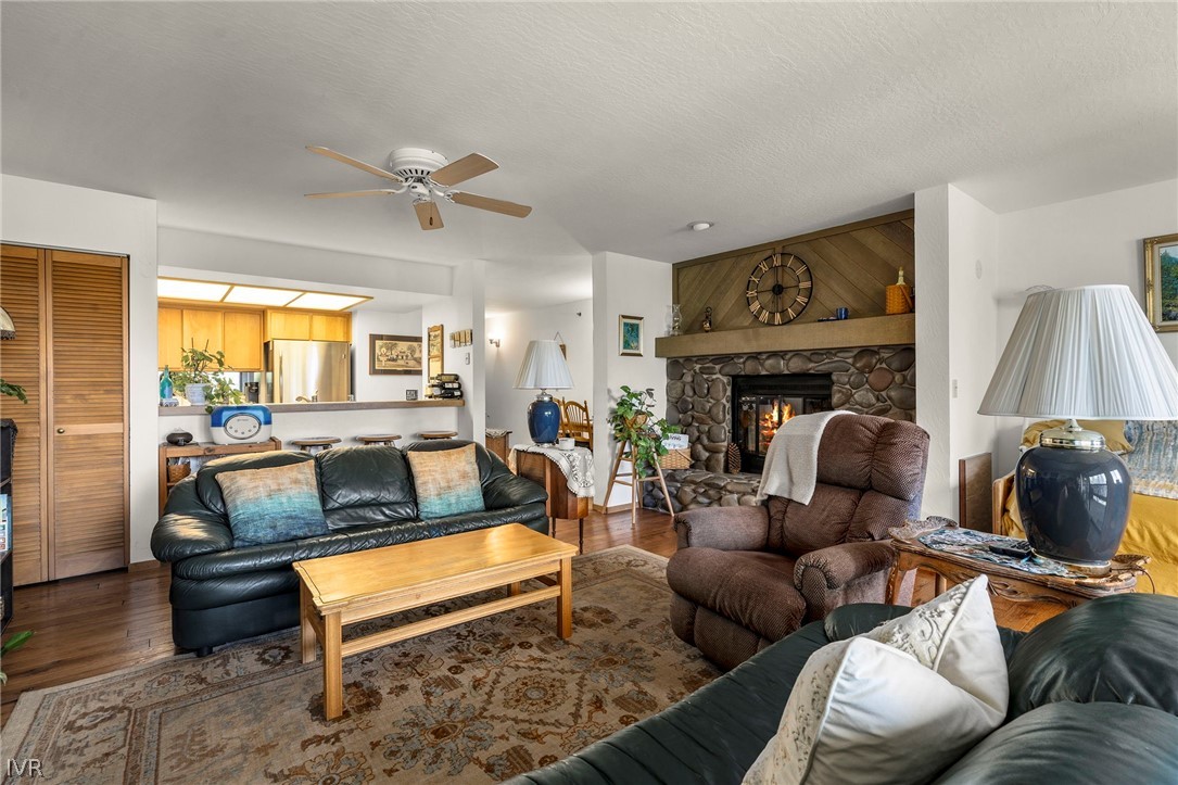 335 Ski Way, Unit 337 Incline Village, NV 89451 - Photo 14 of 23 a living room with furniture flowerpot and a fireplace