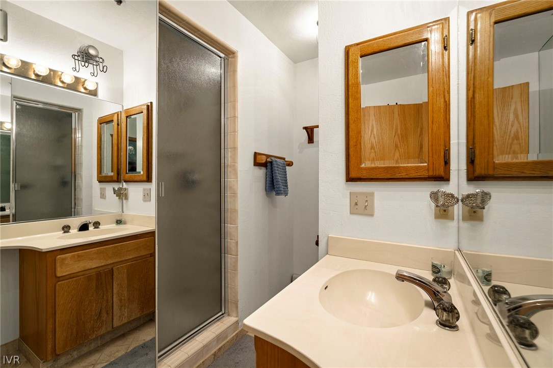 335 Ski Way, Unit 337 Incline Village, NV 89451 - Photo 21 of 23 a bathroom with a sink and a mirror