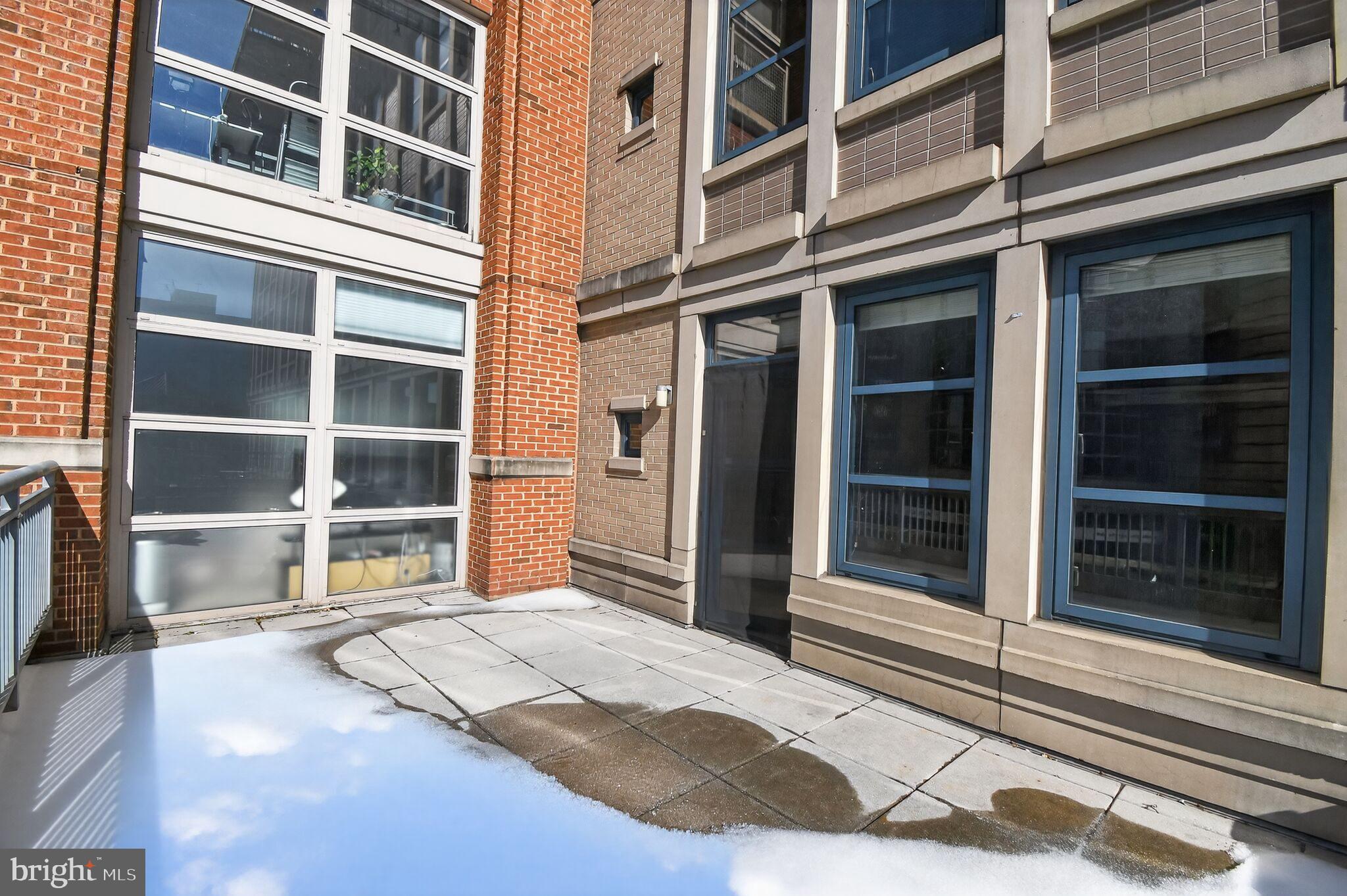 1390 Kenyon Street Northwest, Unit 319 Washington, DC 20010 - Photo 20 of 38 a house with a entrance gate