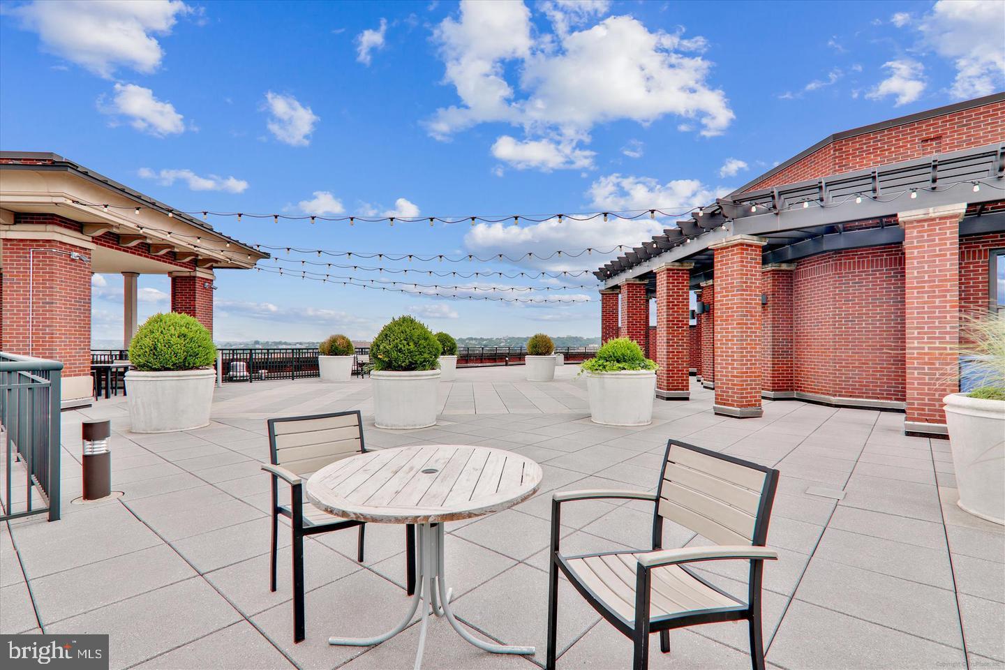 1390 Kenyon Street Northwest, Unit 319 Washington, DC 20010 - Photo 28 of 38 a view of a house with backyard and sitting area