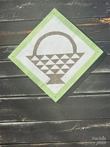 a view of a room with wooden walls