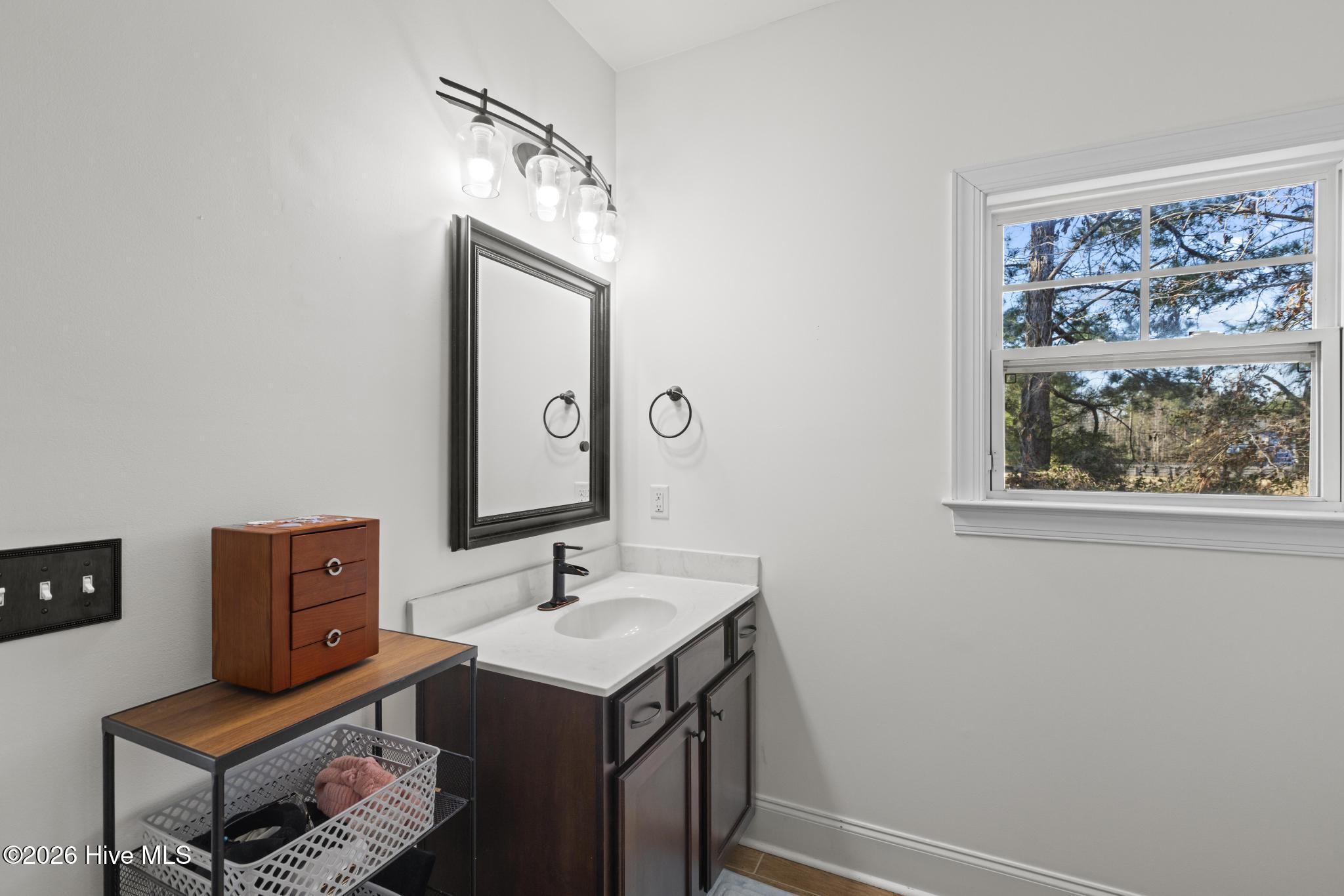 378 Aster Place Hampstead, NC 28443 - Photo 47 of 64 Attached bathroom