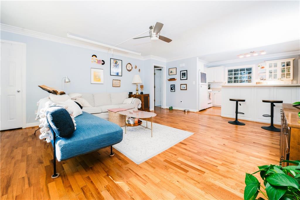 1020 Scott Boulevard, Unit H1 Decatur, GA 30030 - Photo 1 of 1 a living room with furniture and a table