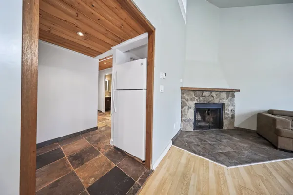 a view of a livingroom with a fireplace