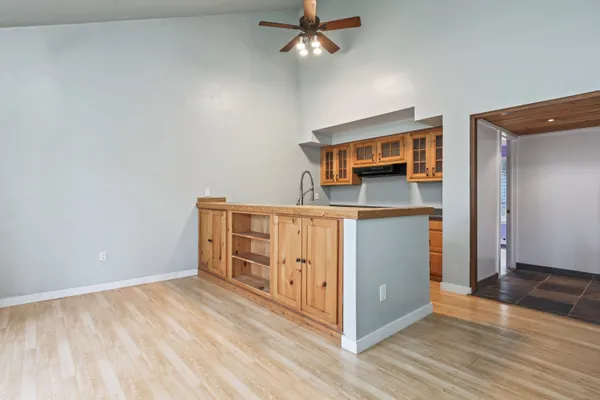 a kitchen with stainless steel appliances a stove and a refrigerator