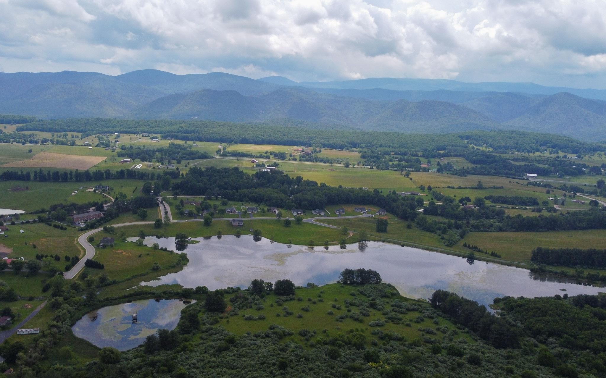 152 Waterfront Drive Raphine, VA 24472 - Photo 8 of 49 an aerial view of lake and city