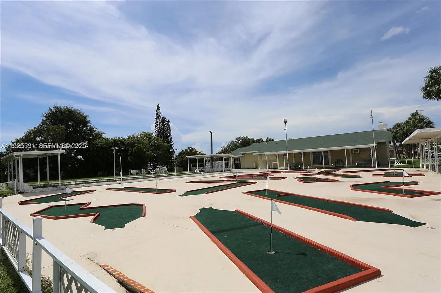 8616 Southwest 16th Place Davie, FL 33324 - Photo 21 of 21 a view of a swimming pool with an outdoor seating