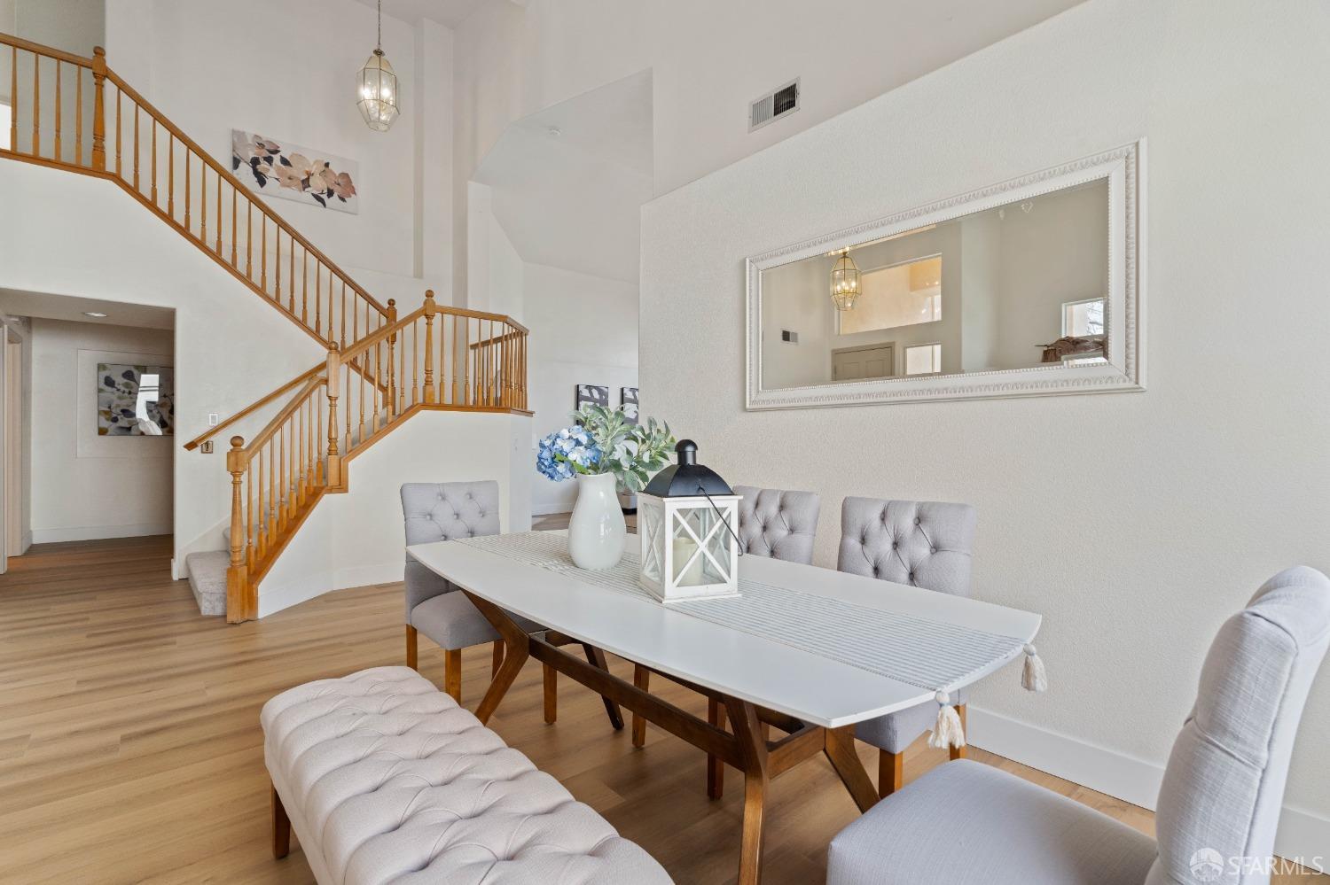 2626 Orange Way Antioch, CA 94531 - Photo 12 of 56 a view of a dining room with furniture a livingroom and wooden floor