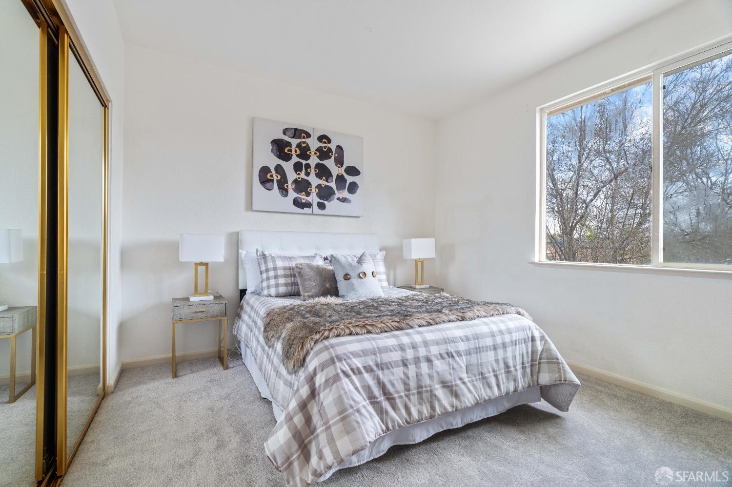 2626 Orange Way Antioch, CA 94531 - Photo 21 of 56 a bedroom with a bed and a painting on the wall