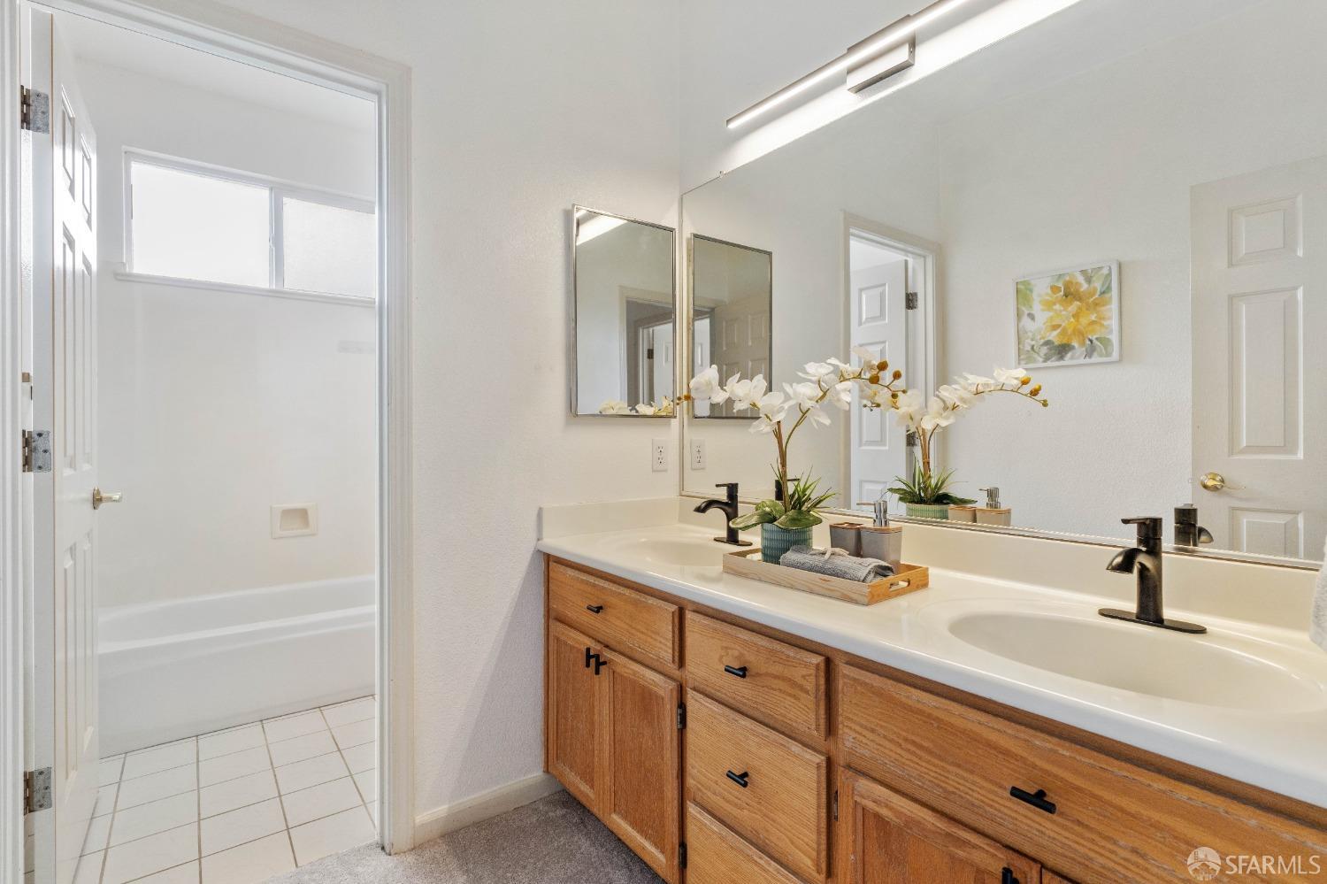 2626 Orange Way Antioch, CA 94531 - Photo 32 of 56 a bathroom with a sink and a mirror