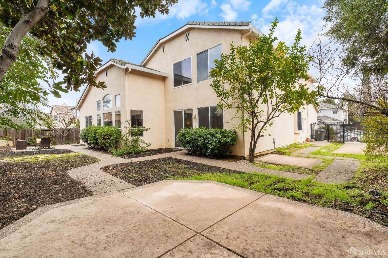 2626 Orange Way Antioch, CA 94531 - Photo 41 of 56 a front view of a house with a yard and garage